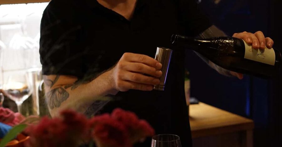 6-Tier Hungarian Wine Tasting at a Cozy Community Table - Who Will Enjoy This Most