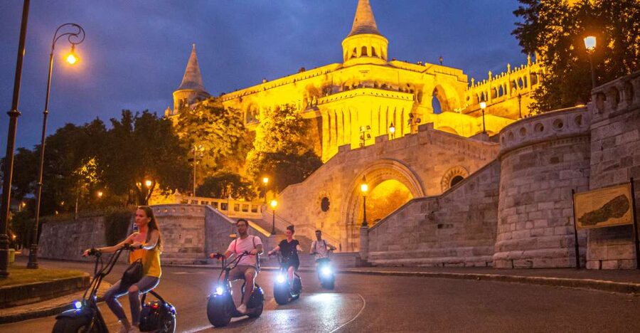 Budapest: Buda Castle E-Scooter Evening Tour - Matthias Church at the blue hour