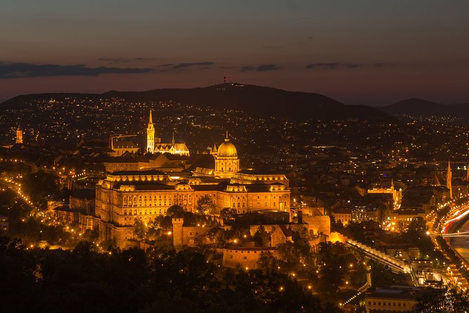 Budapest by night - private driving tour - Fisherman’s Bastion frames the river