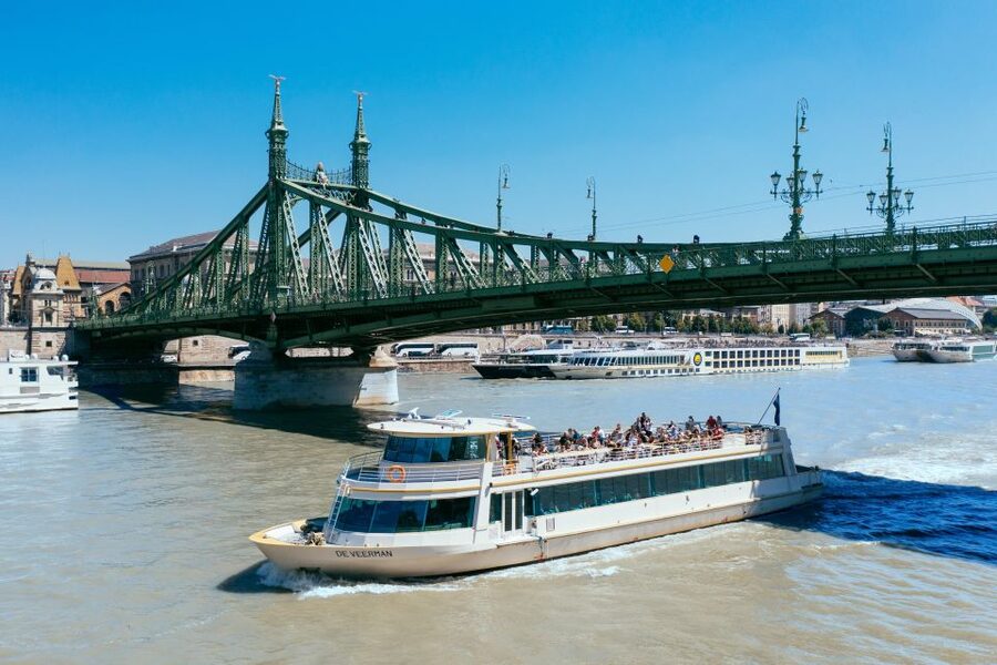 Budapest: Day or Night River Cruise on Panoramic Boat - The return journey through Budapest’s working city