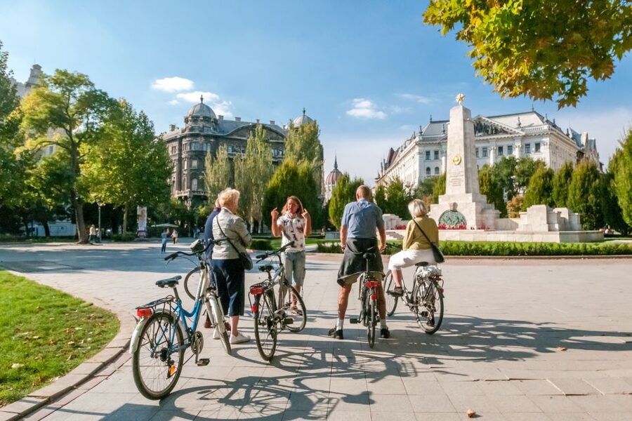 Budapest: Guided City Discovery Bike Tour - Bikes, helmets, and physical effort