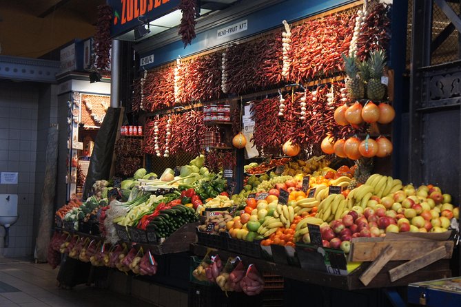Budapest Market Tour & Home Cooking Class with local Chef & Guide - Starting with paprika at Central Market Hall