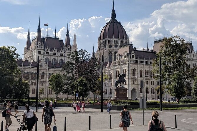 Budapest Private Full Day City Sightseeing Tour Walking or by Car - Shoes on the Danube: a quiet, serious stop