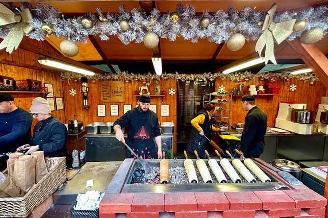 Budapest Wonderland - A Christmas Market Tour with Chimney Cake & Mulled Wine - Learning how chimney cake becomes a Budapest treat