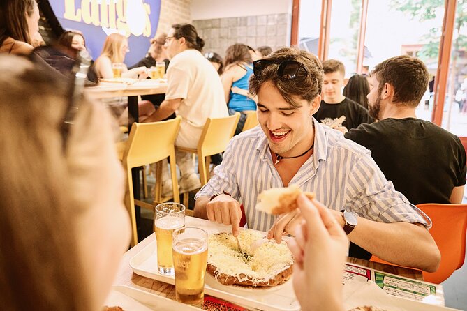 Central Budapest Food Walking Tour with Drinks Included - What the guides add to the meal