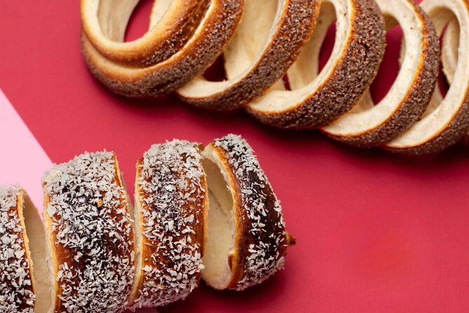 Chimney Cake Workshop Budapest Downtown - Kürtőskalács Class - Making three kürtőskalács from dough to dessert