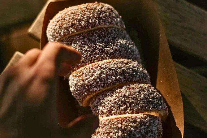 Kürtőskalács: Chimney Cake Workshop in City Park Budapest - Shaping three small chimney cakes